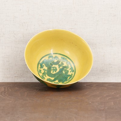 Lot 156 - A Chinese yellow-ground green-enamelled bowl