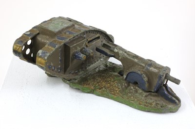 Lot 432 - A 'Starkie's' cast metal World War 1 mark 3 tank and field gun money box