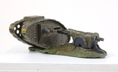 Lot 432 - A 'Starkie's' cast metal World War 1 mark 3 tank and field gun money box