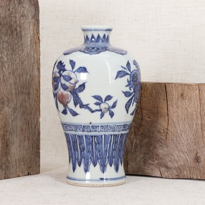 Lot 44 - A Chinese copper-red and underglaze-blue meiping vase