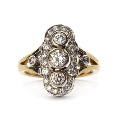 Lot 1135 - An 18ct gold diamond fingerline cluster ring