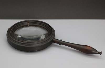 Lot 121 - A magnifying glass