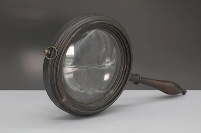 Lot 121 - A magnifying glass