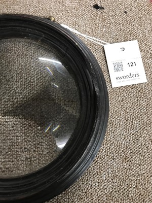 Lot 121 - A magnifying glass