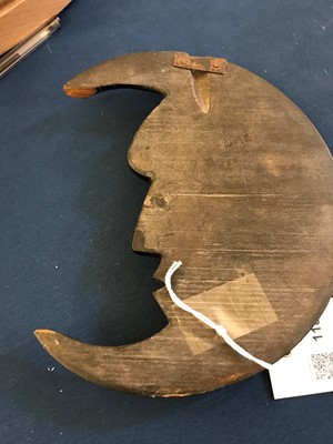 Lot 118 - An unusual ebonised wood plaque