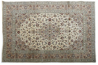 Lot 439 - A Persian Kashan wool carpet