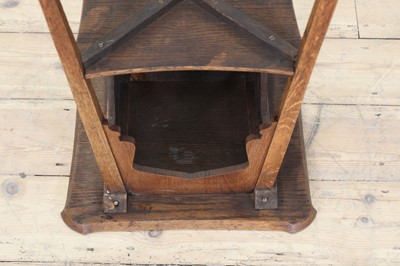 Lot 47 - A Liberty-style oak lamp table
