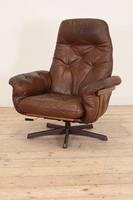 Lot 362 - A Swedish brown leather lounge armchair