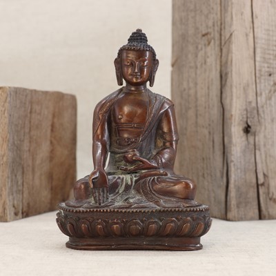 Lot 194 - A Chinese bronze Buddha