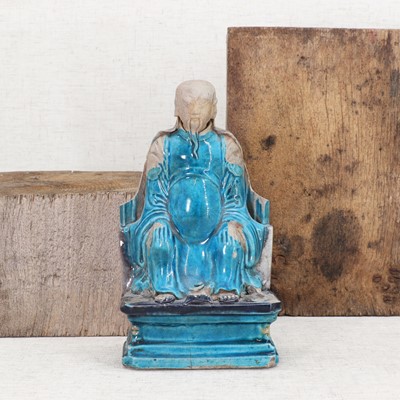 Lot 17 - A Chinese turquoise-glazed figure
