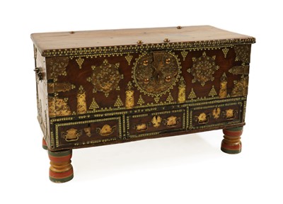 Lot 448 - An Omani hardwood and brass chest