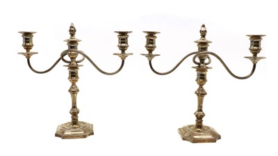 Lot 40 - A pair of silver candelabra