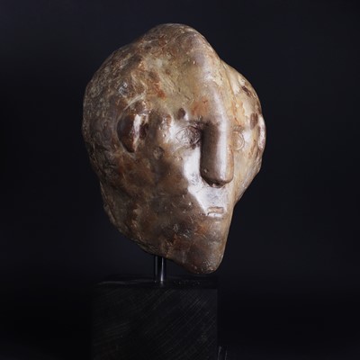 Lot 210 - A Celtic flint head of a young man
