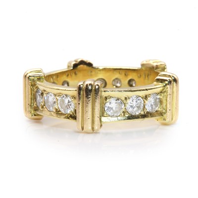 Lot 252 - A gold diamond set band ring