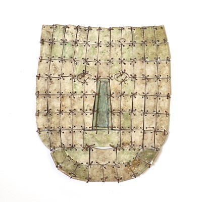 Lot 169 - An archaic Chinese jade or hardstone funerary mask