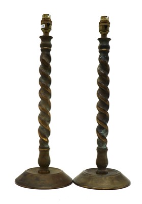 Lot 345 - A pair of brass barley twist candlesticks