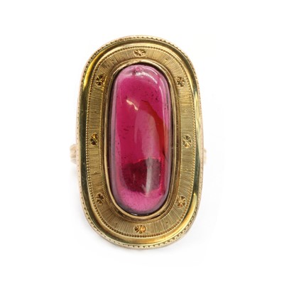 Lot 111 - A gold cabochon garnet ring