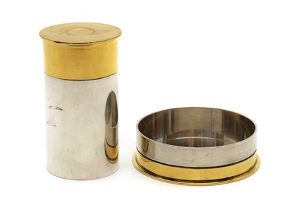 Lot 136 - An Hermès silver and gold plated novelty table lighter