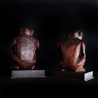 Lot 39 - A rare pair of carved wooden idols