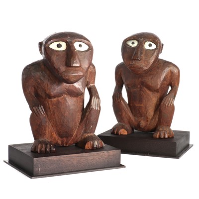 Lot 39 - A rare pair of carved wooden idols