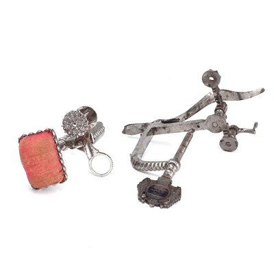 Lot 111 - Five iron sewing clamps