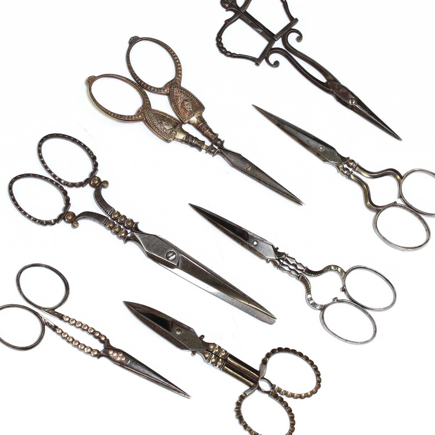 Lot 189 - Seven pairs of cut steel sewing scissors