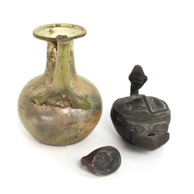 Lot 227 - A small Roman glass vessel