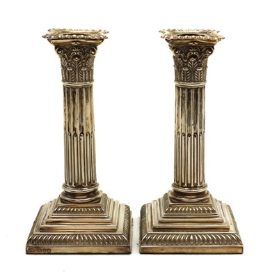 Lot 1 - A pair of late Victorian silver candlesticks
