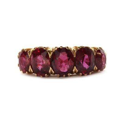 Lot 1043 - A gold five stone ruby ring, c.1910