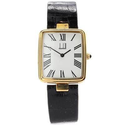 Lot 1434 - A silver gilt Dunhill quartz strap watch