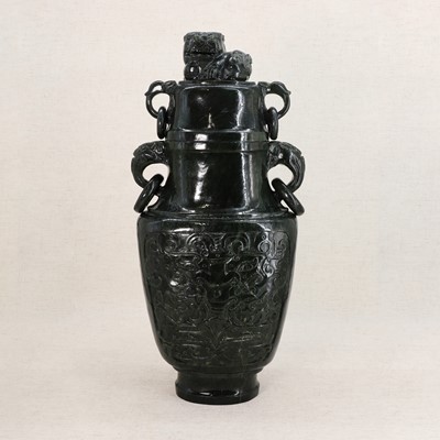 Lot 225 - A Chinese spinach jade vase and cover