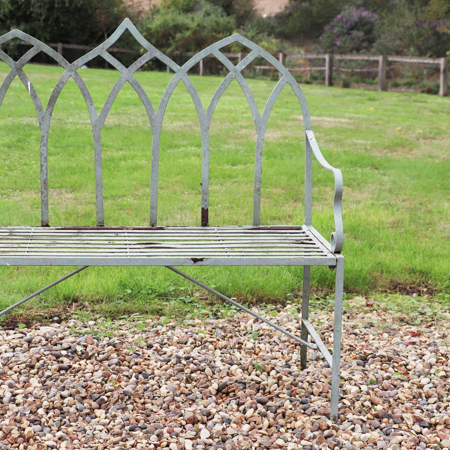 Lot 319 - A Gothic-style wrought iron garden seat