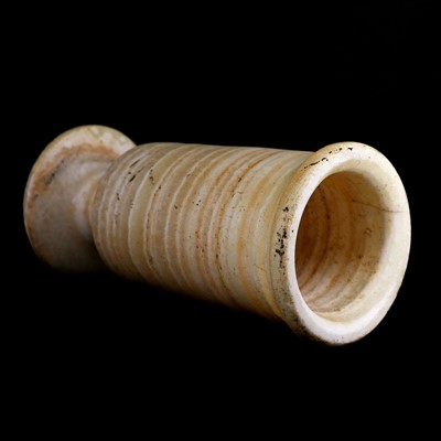 Lot 216 - An Egyptian alabaster vase of cylindrical form