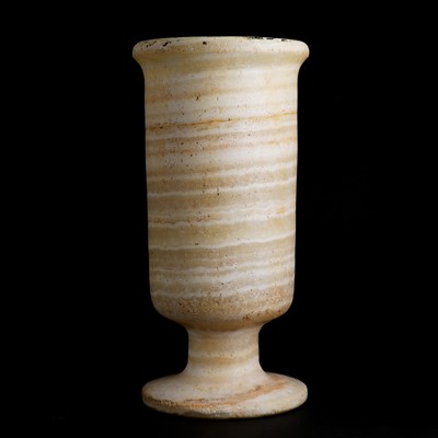 Lot 216 - An Egyptian alabaster vase of cylindrical form
