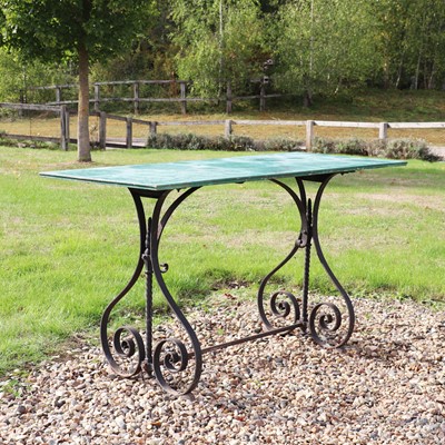 Lot 315 - A wrought iron garden table