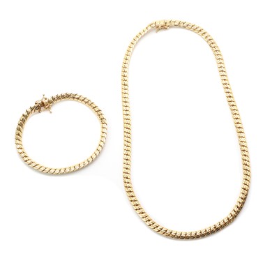 Lot 142 - A 9ct gold necklace and bracelet suite