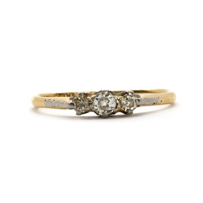 Lot 65 - A gold three stone diamond ring