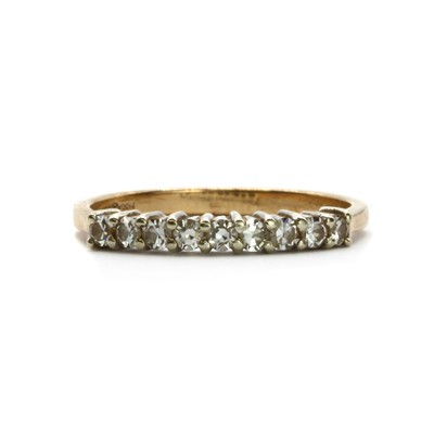 Lot 57 - A 9ct gold diamond half eternity ring