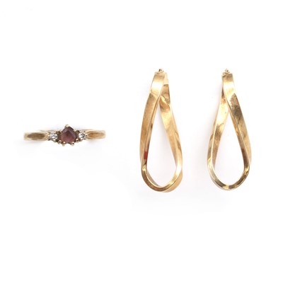 Lot 215 - A 9ct gold amethyst and diamond three stone ring