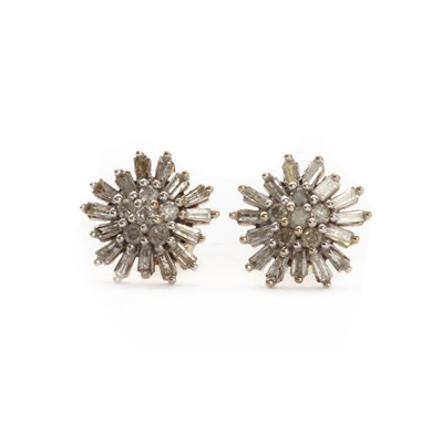 Lot 90 - A pair of gold diamond cluster earrings