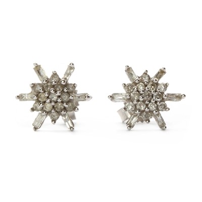 Lot 92 - A pair of white gold diamond cluster earrings