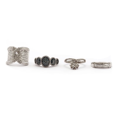 Lot 100 - Four silver diamond set rings