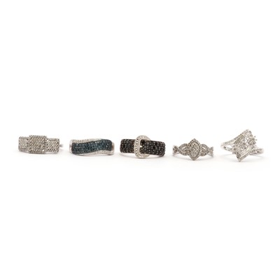 Lot 101 - Five silver diamond set rings