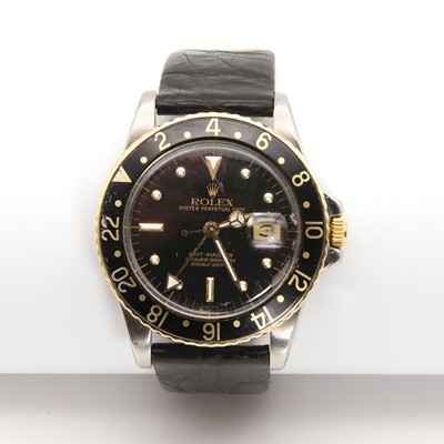 Lot 321 - A gentlemen's bi-colour Rolex 'GMT-Master' automatic strap watch, c.1979