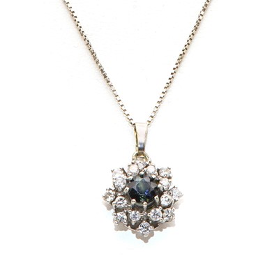 Lot 283 - A 9ct white gold sapphire and diamond cluster pendant