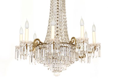 Lot 140 - A cut glass and gilt-metal chandelier