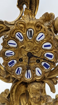 Lot 209 - A French ormolu mantel clock