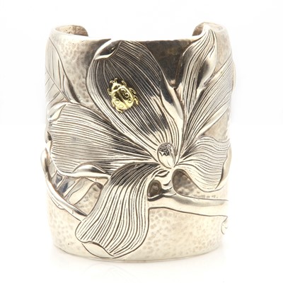 Lot 324 - A sterling silver and 18ct gold 'Magnolia' Manchette, by Tiffany & Co., c.2000