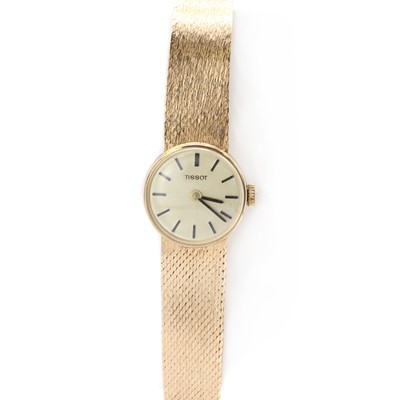 Lot 325 - A ladies' 9ct gold Tissot mechanical bracelet watch