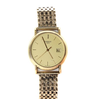 Lot 319 - A gentlemen's 18ct gold Tissot quartz bracelet watch